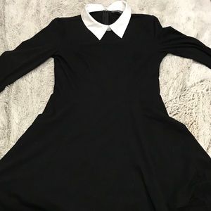 >Black dress with white collar